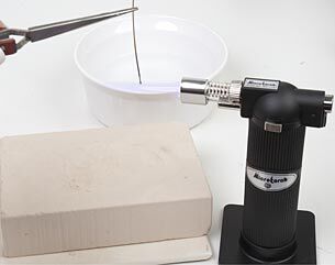 Firing wire with torch